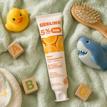 Pasta dental CEELIKE Kids con 5% de hidroxiapatita: aliento fresco, esmalte dental fortalecido y sabor a naranja dulce natural.